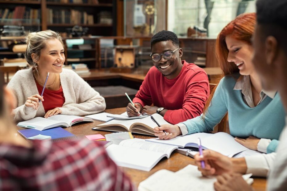 College students studying together and having a good time